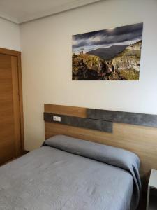 Postel nebo postele na pokoji v ubytování Hostal Rioja Condestable