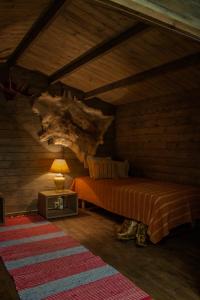 Кровать или кровати в номере Guesthouse Little Tundra