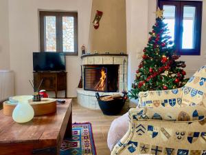 TV a/nebo společenská místnost v ubytování ''Serenia'' Maisonette by Ski Alure
