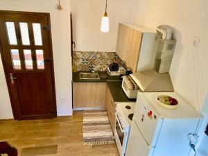 Kuchyň nebo kuchyňský kout v ubytování ''Serenia'' Maisonette by Ski Alure