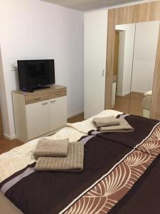 Ένα ή περισσότερα κρεβάτια σε δωμάτιο στο Ferienwohnung Auszeit +6 φωτογραφίες