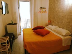 Posteľ alebo postele v izbe v ubytovaní B&B Il Castello