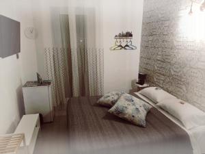 Posteľ alebo postele v izbe v ubytovaní B&B Il Castello