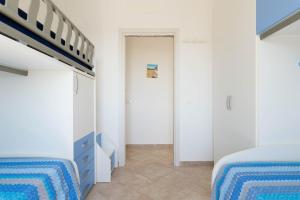 Кровать или кровати в номере Casa D'Amare
