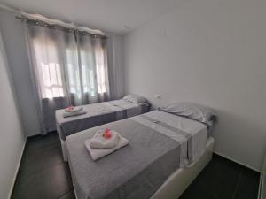 Postel nebo postele na pokoji v ubytování Santapolabeach
