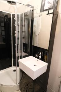 Ванна кімната в L'intimiste - SIPCO Immobilier - Netflix