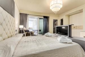 TV a/nebo společenská místnost v ubytování Hotel Buratti