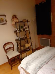 TV a/nebo společenská místnost v ubytování Petit Paradis chez Pascale et Bernard
