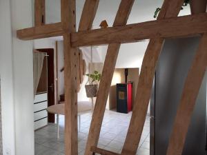 Ένα ή περισσότερα κρεβάτια σε δωμάτιο στο La petite maison