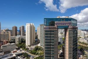 a view of a city skyline with tall buildings at New Modern Gorgeous Views Full Kitchen Waikiki in Honolulu