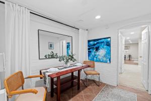 a dining room with a table and chairs at Glover Park/Georgetown Oasis with parking in Washington, D.C.