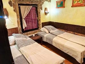 Postel nebo postele na pokoji v ubytování Smeštaj Popović