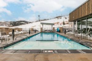 The swimming pool at or close to Apex Residence by All Seasons Resort Lodging