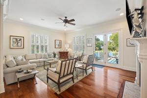 a living room with a couch and chairs at 2482 High Hammock Road in Seabrook Island