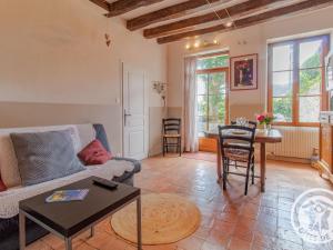 Posezení v ubytování Charmant gîte viticole près de la Loire à vélo, à 10 min d'Angers, parfait pour un séjour à deux - FR-1-622-18