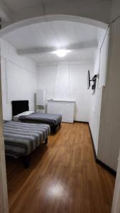 Een bed of bedden in een kamer bij Residencial F y V Spa
