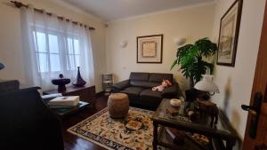 Posezení v ubytování Quarto en-suite Casa Cristina