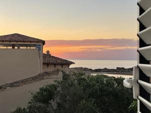 a view of the ocean from a building at Chalet Las Brisas in Cullera
