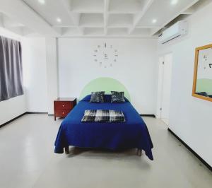 Postel nebo postele na pokoji v ubytování Hotel Allende 104