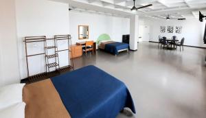 Posezení v ubytování Hotel Allende 104