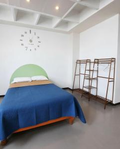 Postel nebo postele na pokoji v ubytování Hotel Allende 104