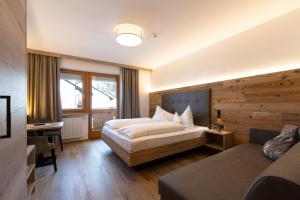 Postel nebo postele na pokoji v ubytování Hotel Thuinerwaldele