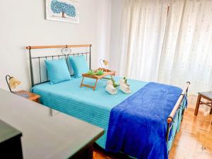 Ένα ή περισσότερα κρεβάτια σε δωμάτιο στο Pátio Privado com Churrasqueira by Férias em Figueira