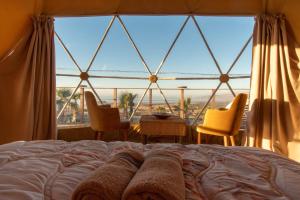 Letto o letti in una camera di Timlalin Dome