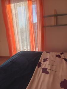 Postel nebo postele na pokoji v ubytování monika