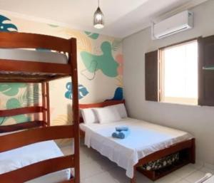 Ένα ή περισσότερα κρεβάτια σε δωμάτιο στο Apart Cozy Jeri