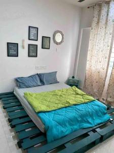 Кровать или кровати в номере LUNA By Namah