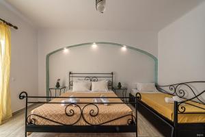 A bed or beds in a room at Katerina View