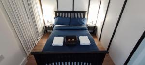 Lova arba lovos apgyvendinimo įstaigoje Surrey Quays Residency - Serviced rooms