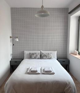 a bedroom with a bed with two trays on it at La Morera in Alcaraz