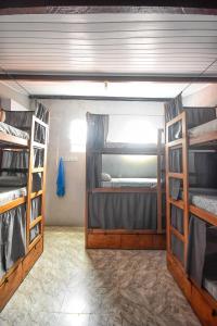 Palanda nebo palandy na pokoji v ubytování Hostel Rota 027 Itacaré
