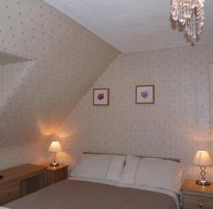 Postel nebo postele na pokoji v ubytování St Annes Guest House