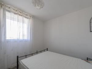 Postel nebo postele na pokoji v ubytování Appartement Châtelaillon-Plage, 2 pièces, 4 personnes - FR-1-535-37