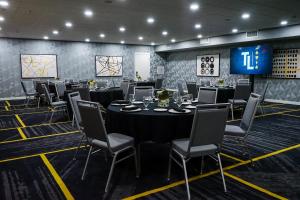 a conference room with a long table and chairs at Hampton Inn at Tin Lizzie Gaming Resort in Deadwood