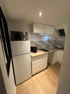 Ett kök eller pentry på Appartement cocooning