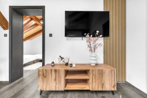 TV a/nebo společenská místnost v ubytování Hotel U Krále Jiřího