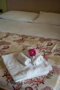 Postel nebo postele na pokoji v ubytování CapoSud - Appartamento Marina