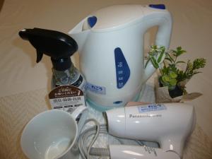 a counter top with a mixer and a coffee maker at Hotel Wakow - Vacation STAY 22131v in Yonago
