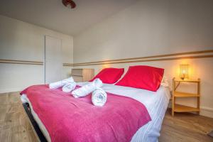 Una cama o camas en una habitación de The Climbing - Caserne de Bonne