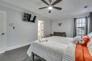 a bedroom with a bed and a ceiling fan at College Park Home 13 Mi to Downtown Atlanta! in College Park