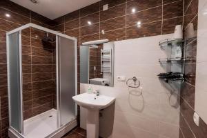 Koupelna v ubytování Cabernet Corner + 18 fotografií