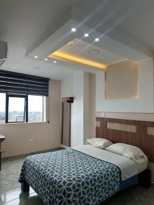 מיטה או מיטות בחדר ב-Hotel Torre Azul