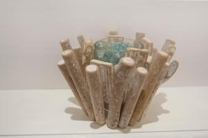 a vase sitting on a table with a glass at Selkies Retreat ✪ Grampian Lettings Ltd in Aberdeen +26 photos