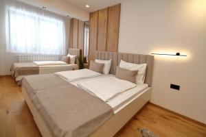 En eller flere senger på et rom på Bjelasnica A13
