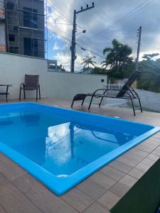 La alberca dentro o cerca de Hospedagem Entre Marés