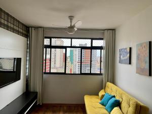 Zona de estar de Apartamento Alto Astral com 1 vaga no Centro